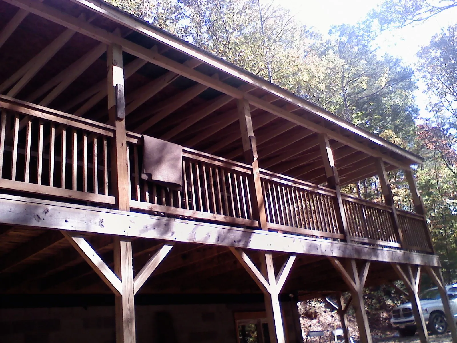 Timber framing under a new elevated porch and deck — Roof Leak Repair in Alum Bank by Roofing Brothers